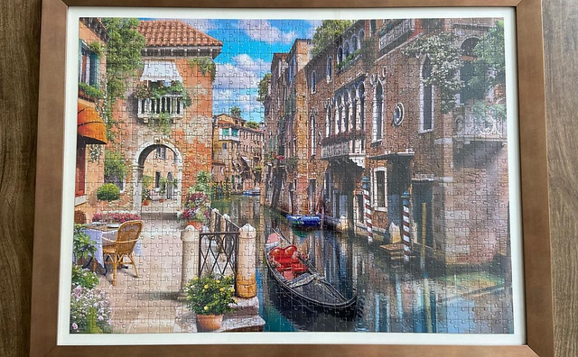 como emoldurar quebra cabeça