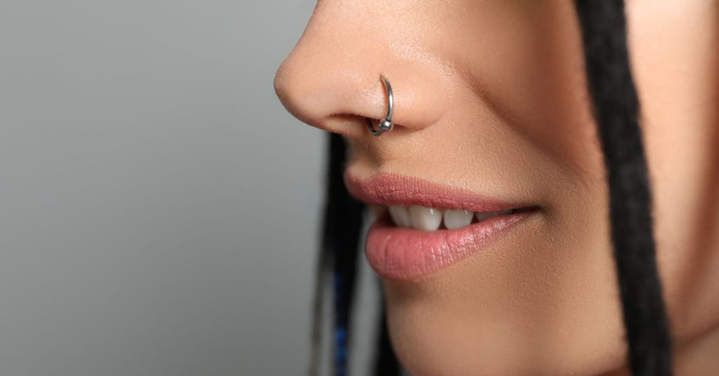 piercing no nariz argolinha ou ponto